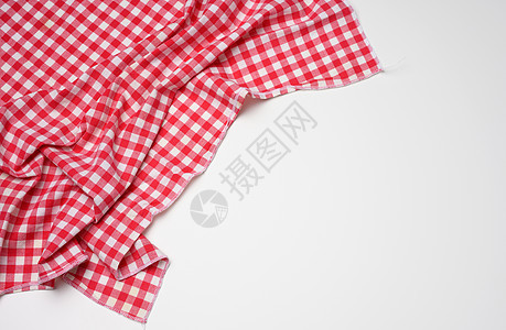 白色背景上折叠的棉红白餐巾纸抹布野餐红色餐巾厨房检查餐厅材料正方形毛巾图片
