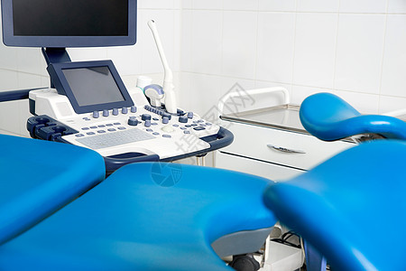 现代诊所内配有椅子和设备的妇科室病人房间医院母亲药品诊断婴儿泌尿科技术外科图片