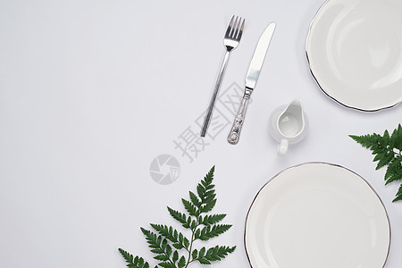 白色背景的陶瓷板 风景顶端银器用餐餐厅菜肴食物餐具桌子环境乡村红色背景图片