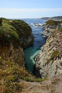 内地海岸悬崖旅行蓝色海洋海滩岩石海岸线旅游天空风景图片