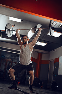 码头头顶健身房专注力量举重肌肉杠铃重量生活方式训练运动员图片