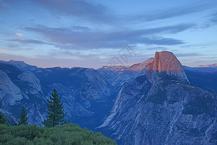 冰川点 Yosemite绿色日落岩石圆顶山脉旅行游客橙子国家蓝色图片