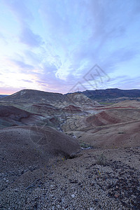 涂漆的矿石山沙漠爬坡黄色旅行天空国家化石风景岩石纪念碑图片