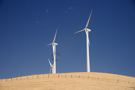 风力涡轮机黄色力量场地技术爬坡发电机金子农场天空风车图片