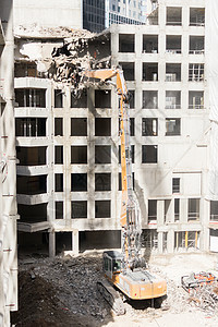 建筑物的拆除工地废墟机械石头碎片机器危险工具建筑学房子推土机图片