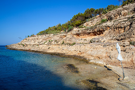 夏季Cala Greca的景象蓝色旅游海岸线假期目的地海岸胜地悬崖海滩天蓝色图片