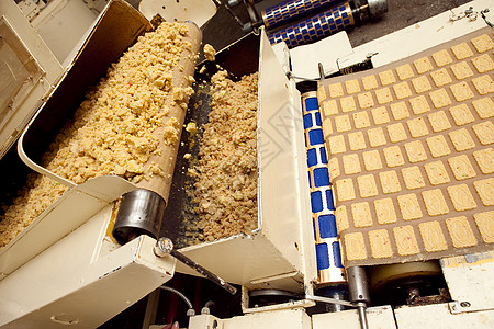 工厂里做饼干的机器机器人制造业商业食品加工团体加工产品工作自动化巧克力图片