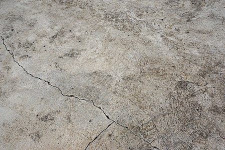 水泥地不是灰色的 有裂缝 将水泥分成大小不等的 3 份 纹理或背景图片