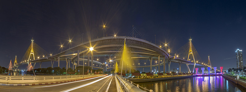 Bhumibol大桥河大桥 晚上用多种颜色打开灯光海景夜空工程色光风景建筑学场景天空街道夜景图片