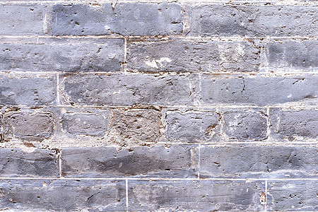 真正的灰色古董复古砖色调图案墙背景在一个古老的中国房子特写上平顶前视图苦恼建筑墙纸材料艺术城堡岩石框架砖墙风化图片