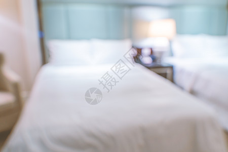 干净又舒适的现代酒店卧室室内有双张床 抽象地脱离焦点 与bokeh背景相混淆 设计奢侈旅行的概念床头商业床垫套房家具床头板房间奢图片