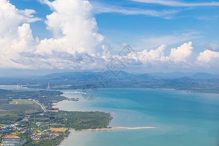 泰国飞机上蓝色天空的云顶风景天堂空气旅行商业涡轮喷射技术日落航班假期图片