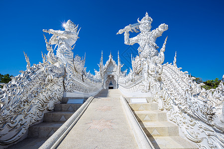 泰国白寺建造装饰品蓝色寺庙佛教徒假期风格教会文化雕塑图片