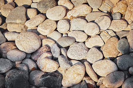 石头纹理特写不同形状的石头岩石材料碎石背景海滩花岗岩矿物海岸线白色鹅卵石图片