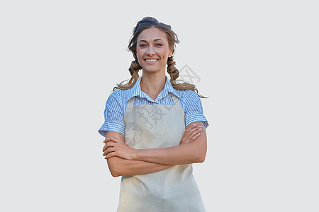 身着白底围裙的妇女 穿制服的高加索中年女商业主妇女餐厅文员厨师微笑园丁商务冒充服务员人士职员图片