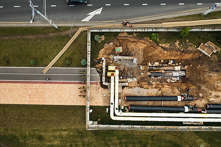 修复和更换明斯克的管道 更换城市的旧管道 修复城市 白俄罗斯施工下水道交通防水安装金属替代品沥青街道地球图片