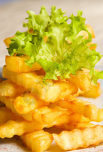 新鲜炸薯条油炸餐厅午餐晚餐小吃土豆脂肪桌子服务食物图片