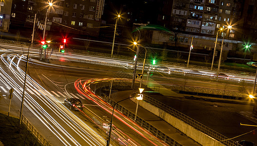 夜间路交叉路口景观运动道路场景速度驾驶城市车辆街道反射图片