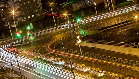 夜间路交叉路口运输运动速度街道汽车反射场景景观交通城市背景图片