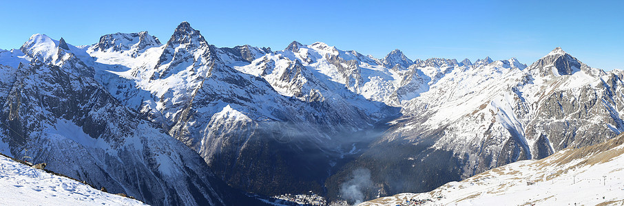 冬山全景活动闲暇山脉冰川单板场景地平线蓝色滑雪岩石背景图片