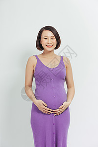 白色背景的美丽孕妇 美丽的孕妇婴儿母亲眼睛母性腹部家庭女性女士肚子背景图片