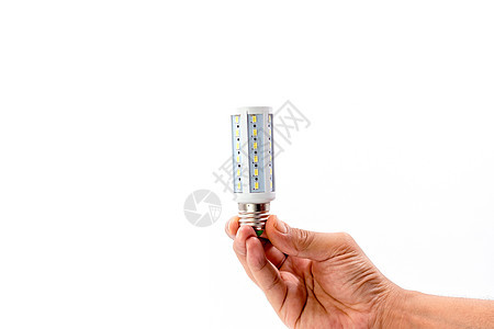 人类手握着白色背景的LED灯泡环境玻璃白炽灯电子标准活力生态电气圆顶经济图片