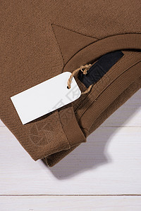 衬衫价格标签 矩形标签附在一件毛衣上纺织品棉布空白细绳黑色购物材料白色销售裙子图片