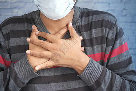 年轻人咳嗽和打喷嚏疾病面具男人过敏医疗疼痛感染流感图片