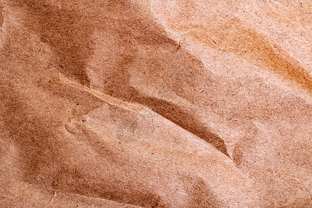 皱巴巴的棕色纸特写抽象背景乡村空白羊皮纸纸板工艺床单折痕材料回收褐色图片