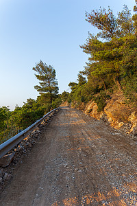希腊雅典海米图斯山区乡村公路踪迹空路模仿日光农村晴天爬坡山路碎石风景图片
