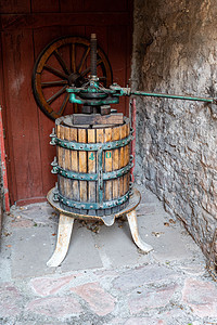 古代压碎葡萄的按键文化乡村机器藤蔓农业酒厂木头果汁工艺酿酒图片