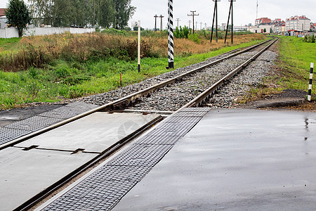 铁路铁路和石块封闭 绿草乡村平行线火车石头过境货运绿色曲线基础设施交通图片
