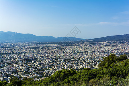 雅典市的全景 从希米特斯山看天空场景建筑景观地平线风光风景城市建筑物树木图片