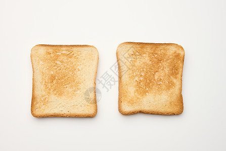 由面粉白面粉制成的面包片 在烤面包机中烤熟 顶视图图片