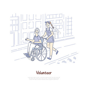 微笑的女志愿者帮助轮椅老人图片