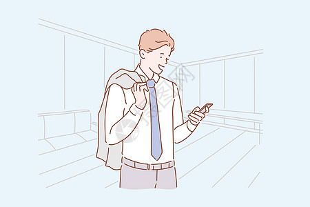 一个穿着西装的年轻快乐男人看着手机的商业理念 快乐的商务人士在网上与办公室的同事交谈图片