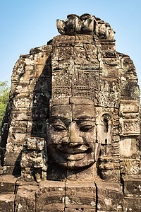 柬埔寨Bayon寺塔上的佛教徒笑脸旅行地标收获雕刻旅游岩石建筑考古学高棉语寺庙图片