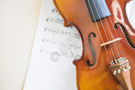 古典木制小提琴弦乐音符图片