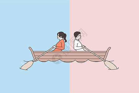 船上的男人和女人向不同的方向划船图片