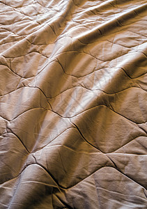 毯子碎在床上床单酒店灰色棉布枕头休息卧室房间图片