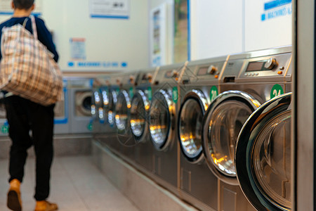 洗衣店的洗衣机自动化器具服务民众家务衣服商业旋转洗涤剂公用事业图片