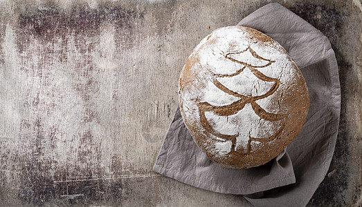 剪切板上的黑麦面包 特写包子木头小麦白色面包食物金子棕色面包师面粉图片
