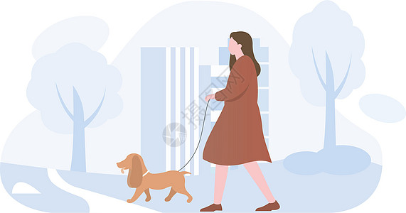一个女人带着她的狗去散步图片