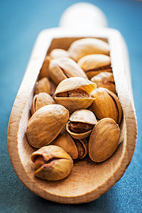 Pistachios 螺旋藻营养棕色种子绿色坚果食物盐渍团体小吃图片