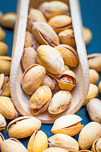 Pistachios 螺旋藻小吃营养棕色食物坚果团体种子绿色盐渍图片