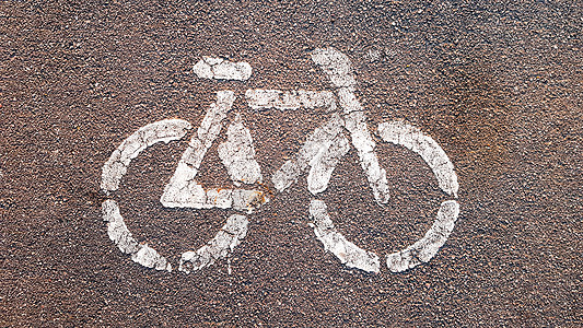 公园道路上的自行车标志或图标牌安全运动小路车道田径赛信号沥青途径城市路线图片
