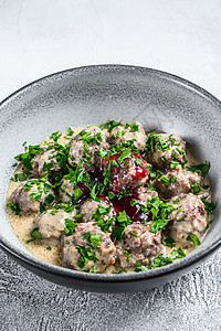 餐盘上有奶油酱的地牛肉肉丸 白木背景 顶层风景猪肉油炸盘子食物营养美食蔬菜菜单肉丸火鸡图片