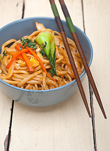 手拉拉面乡村筷子叶子文化用餐面条食物饮食盘子拉面图片