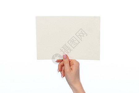 女性手持白纸空白白纸 与白色隔绝营销职业优惠券广告身份手指文档成功卡片棕榈图片