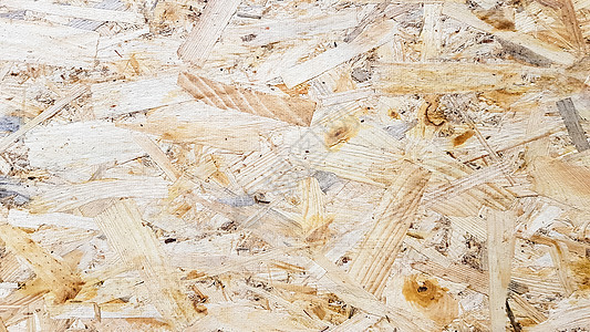 OSB薄布是用棕褐色木屑制成的 阁楼墙壁表面 建房子的材料刨花板木头木板纹理回收粮食粒子控制板锯末板材图片
